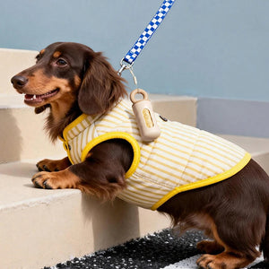 Twist-lock waste bag dispenser with leash attachment strap for dogs