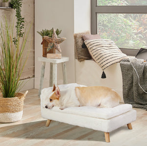 Elevated Nordic-style pet bed with wood legs for small dogs and cats