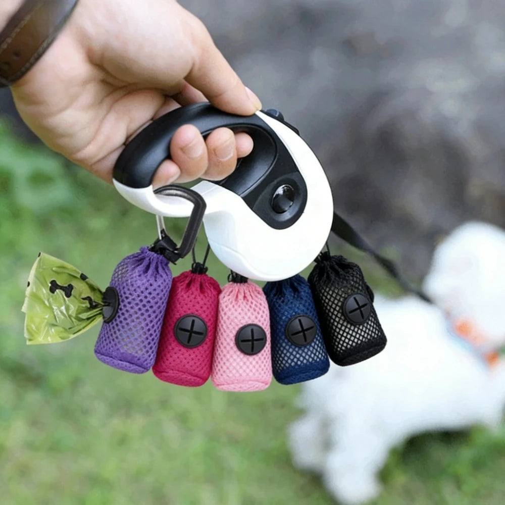 Compact waste bag holder that clips onto a dog leash