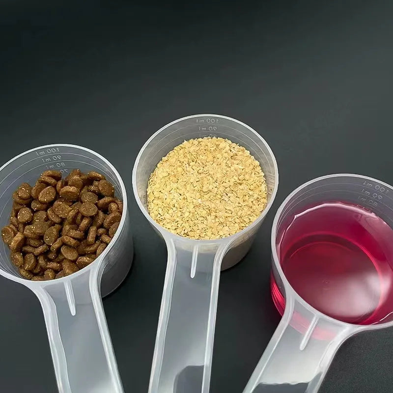Plastic pet food measuring spoon with 50g/100ml scale