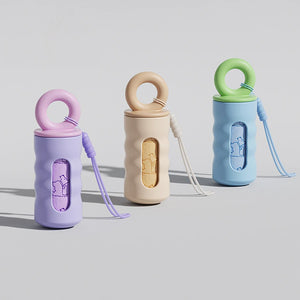 Twist-lock waste bag dispenser with leash attachment strap for dogs