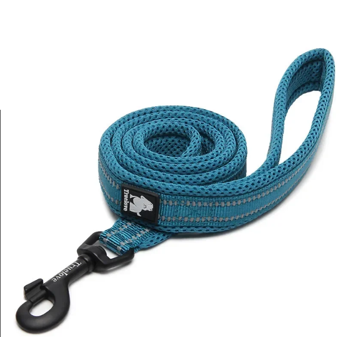 A coiled blue woven dog leash with a black metal swivel snap hook and a small black brand patch, photographed on a plain white background.
